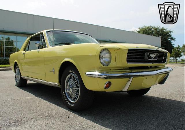 Photo of 1966 Yellow Ford Mustang