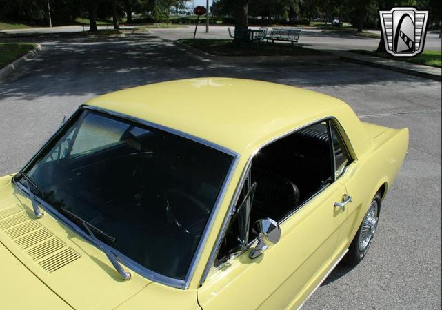 Photo of 1966 Yellow Ford Mustang