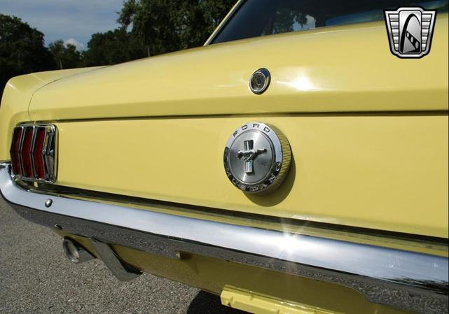 Photo of 1966 Yellow Ford Mustang