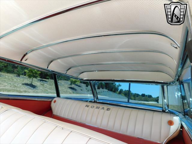 Photo of 1955 Orange Chevrolet Nomad