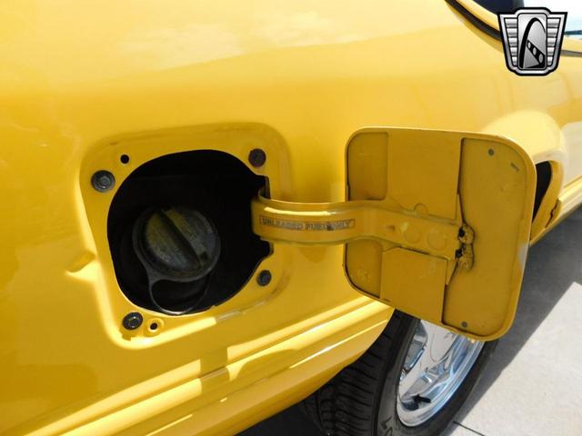 Photo of 1993 Yellow Ford Mustang