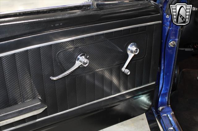 Photo of 1965 Blue Ford Mustang