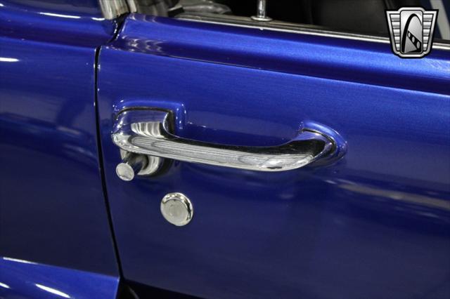 Photo of 1965 Blue Ford Mustang