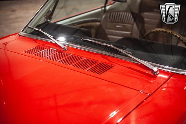 Photo of 1965 Red Ford Mustang