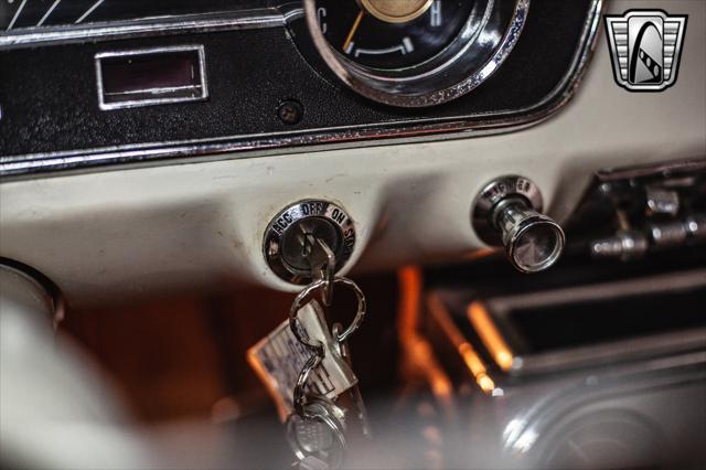 Photo of 1965 Red Ford Mustang