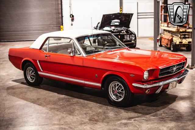 Photo of 1965 Red Ford Mustang