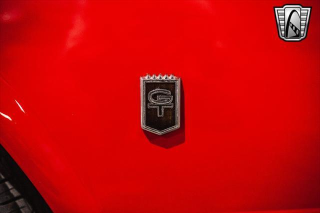 Photo of 1965 Red Ford Mustang