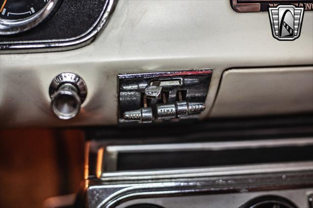 Photo of 1965 Red Ford Mustang