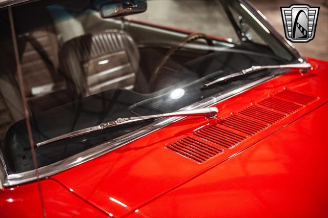 Photo of 1965 Red Ford Mustang