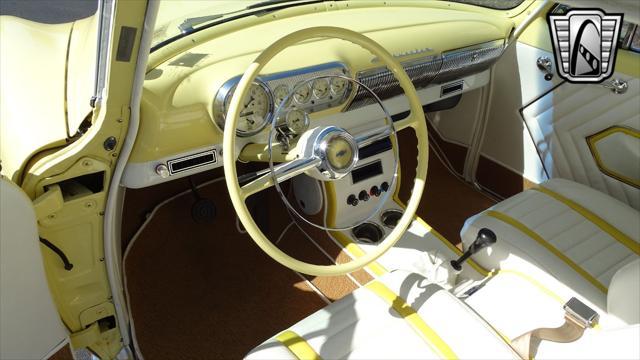 Photo of 1954 Yellow/White Chevrolet Bel Air