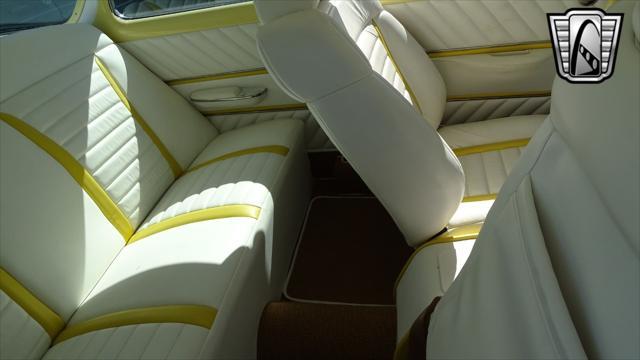 Photo of 1954 Yellow/White Chevrolet Bel Air