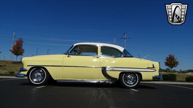 Photo of 1954 Yellow/White Chevrolet Bel Air