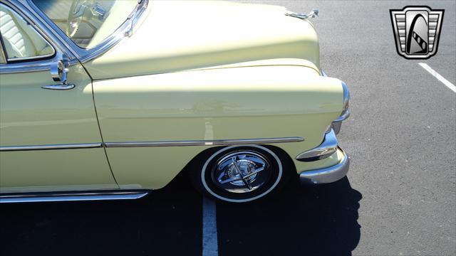 Photo of 1954 Yellow/White Chevrolet Bel Air