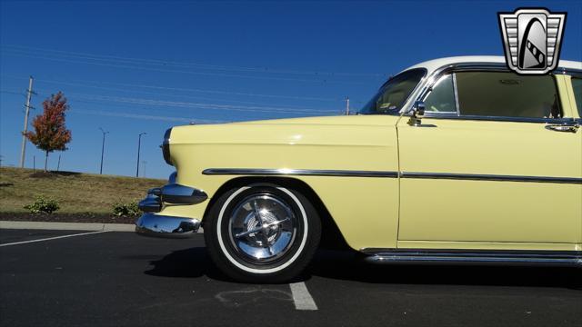 Photo of 1954 Yellow/White Chevrolet Bel Air