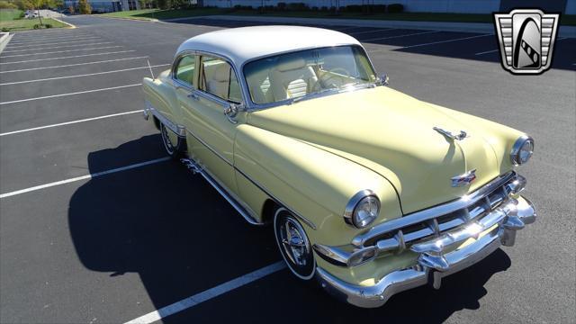 Photo of 1954 Yellow/White Chevrolet Bel Air
