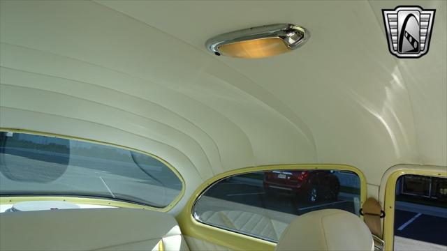 Photo of 1954 Yellow/White Chevrolet Bel Air