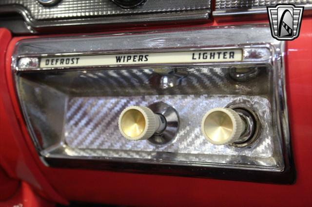 Photo of 1958 Custom Pink Coral/ Colonial White Ford Fairlane 500