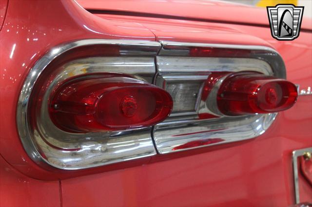 Photo of 1958 Custom Pink Coral/ Colonial White Ford Fairlane 500