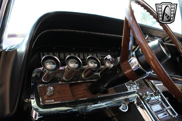 Photo of 1965 Maroon Ford Thunderbird