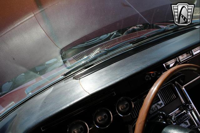 Photo of 1965 Maroon Ford Thunderbird