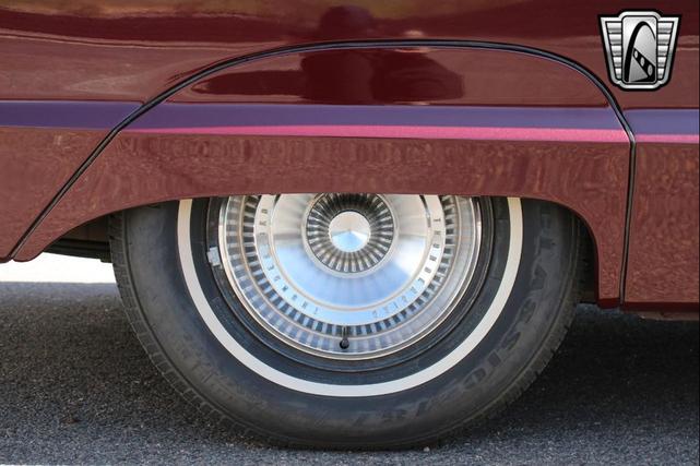 Photo of 1965 Maroon Ford Thunderbird