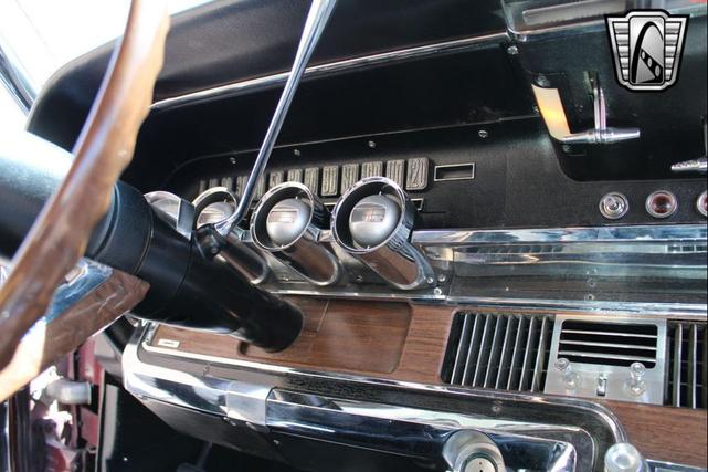 Photo of 1965 Maroon Ford Thunderbird