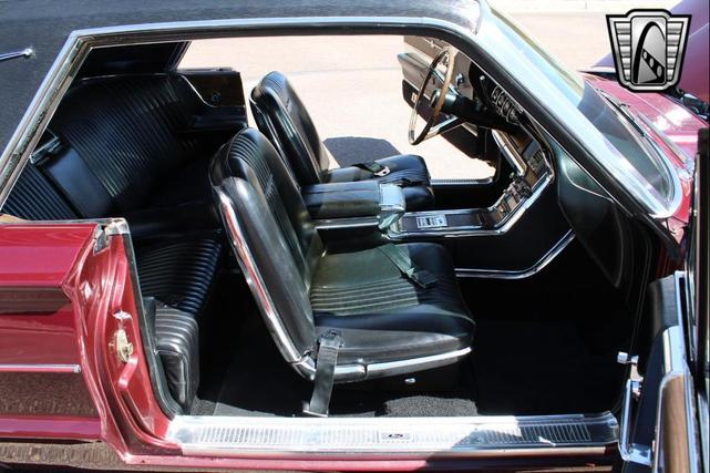 Photo of 1965 Maroon Ford Thunderbird
