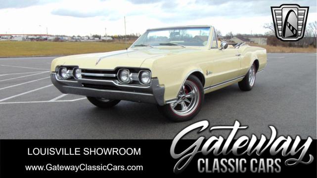 Photo of 1967 Saffron Yellow Oldsmobile Cutlass