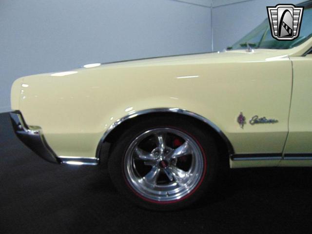 Photo of 1967 Saffron Yellow Oldsmobile Cutlass