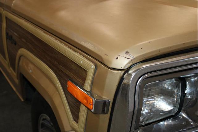 Photo of 1987 Gold Jeep Grand Wagoneer