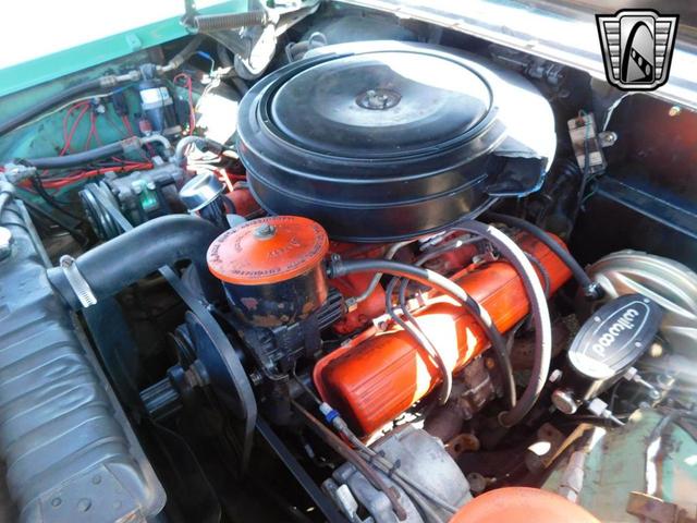 Photo of 1957 Teal Cadillac DeVille
