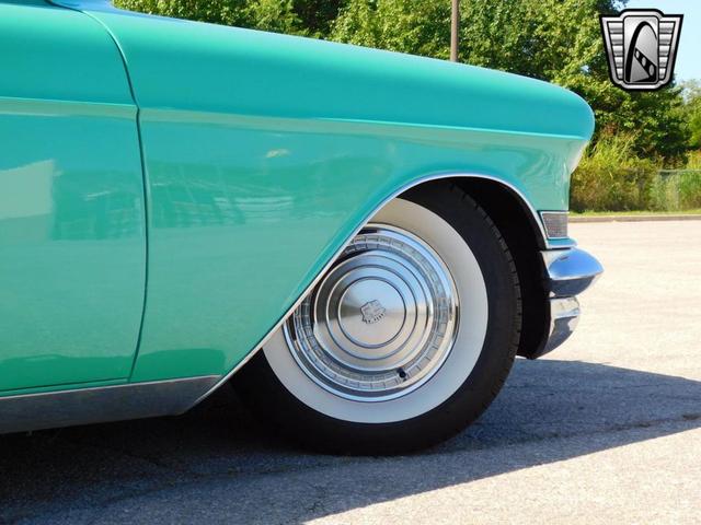 Photo of 1957 Teal Cadillac DeVille