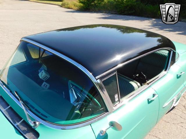 Photo of 1957 Teal Cadillac DeVille