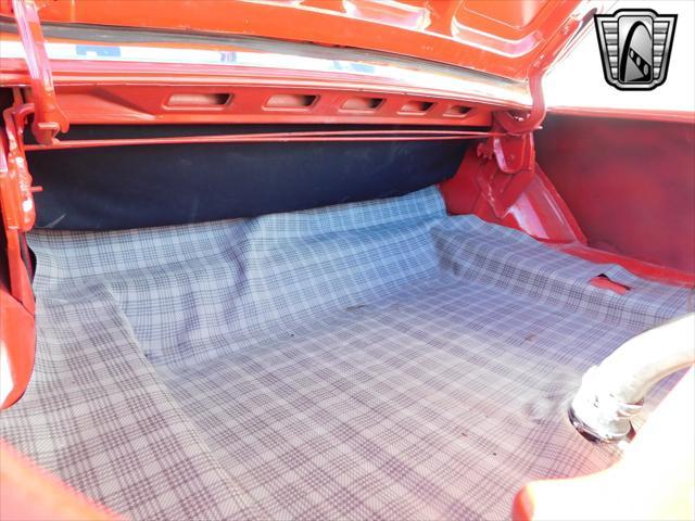 Photo of 1965 Red Ford Mustang