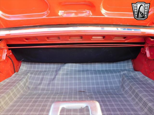 Photo of 1965 Red Ford Mustang