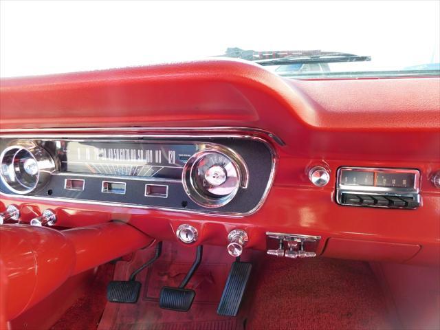 Photo of 1965 Red Ford Mustang