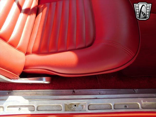 Photo of 1965 Red Ford Mustang