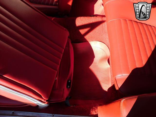 Photo of 1965 Red Ford Mustang