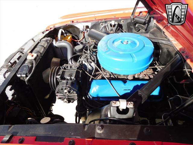 Photo of 1965 Red Ford Mustang