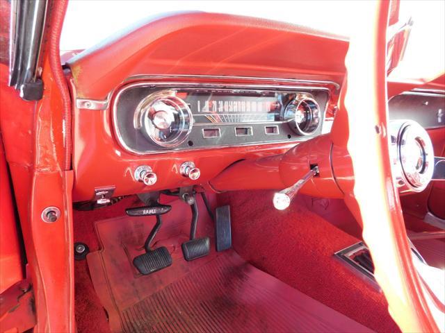 Photo of 1965 Red Ford Mustang