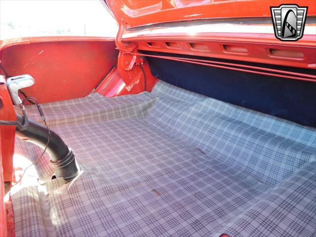 Photo of 1965 Red Ford Mustang