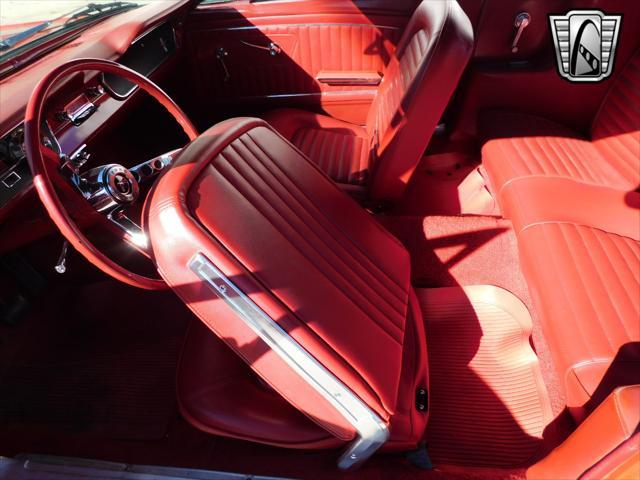 Photo of 1965 Red Ford Mustang