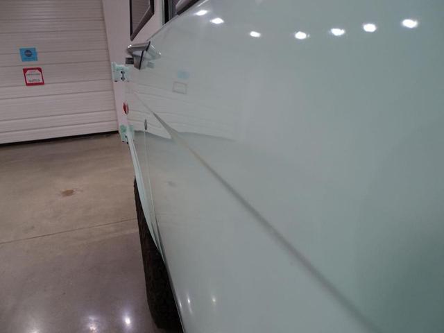 Photo of 1975 Sea foam Green Ford Bronco