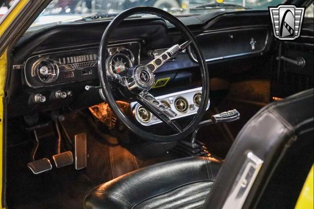 Photo of 1965 Yellow Ford Mustang