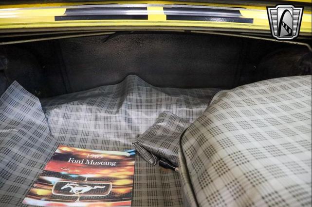 Photo of 1965 Yellow Ford Mustang