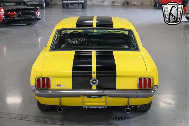 Photo of 1965 Yellow Ford Mustang