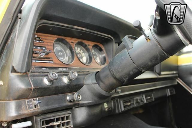 Photo of 1976 Yellow Jeep Wagoneer