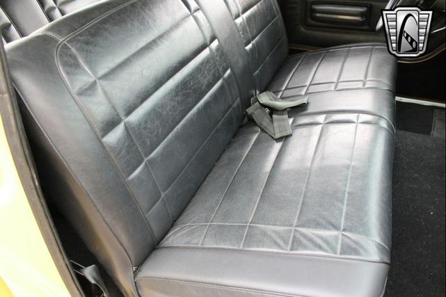 Photo of 1976 Yellow Jeep Wagoneer