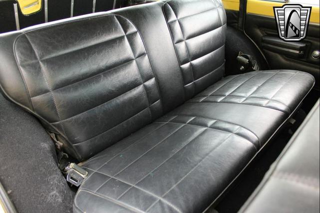 Photo of 1976 Yellow Jeep Wagoneer