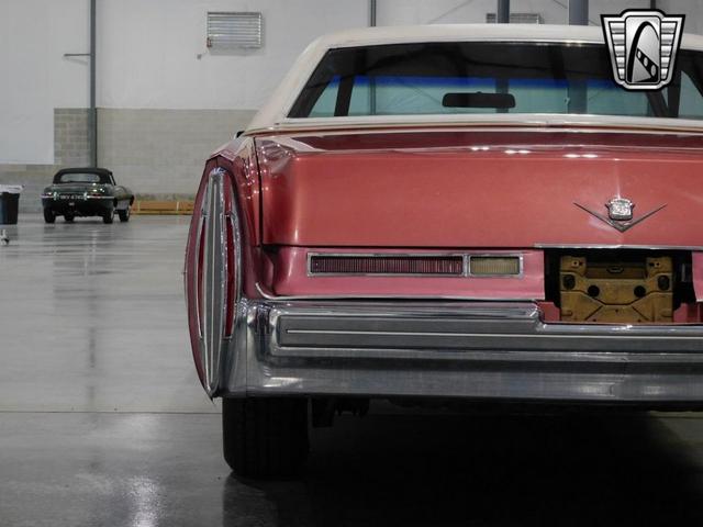 Photo of 1975 Red Cadillac DeVille